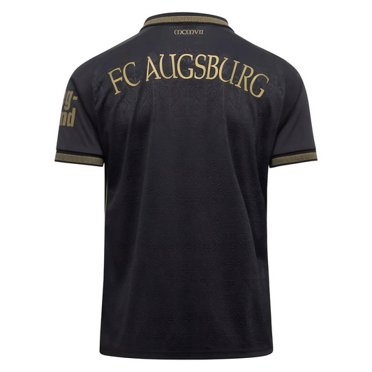 FC Augsburg 2025/2026 Third Jersey back custom Black with rich gold trim, embossed Roman artifact pattern, polo collar, and MCMVII (1907) Roman numerals at neck.