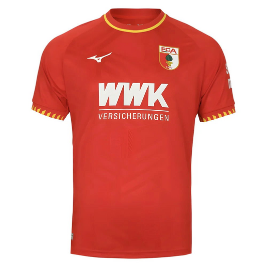 FC Augsburg 2025/2026 Away Jersey. Solid red with yellow collar and cuff accents, subtle Swabian coat-of-arms jacquard pattern, and FCA crest.