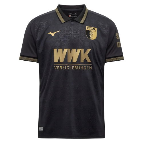 FC Augsburg 2025/2026 Third Jersey. Black with rich gold trim, embossed Roman artifact pattern, polo collar, and MCMVII (1907) Roman numerals at neck.